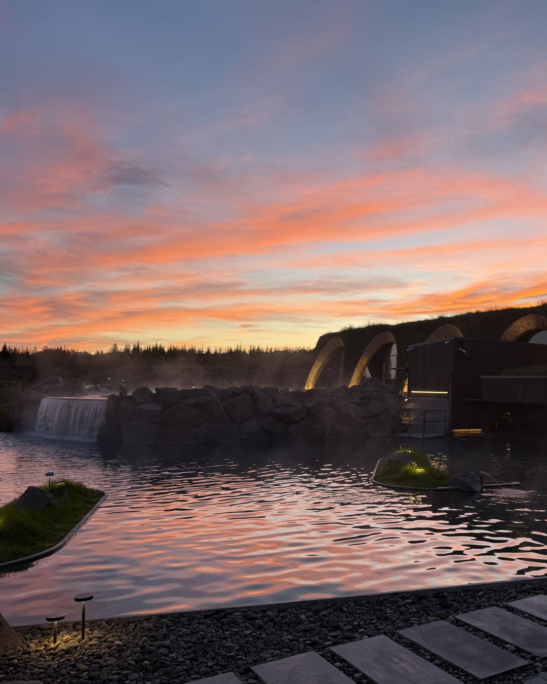 Laugarás Lagoon geothermal pools at sunset in South Iceland
